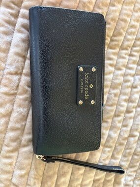 Beautiful Kate Spade Black Pebbled Leather Wristlet Wallet with Gold Logo